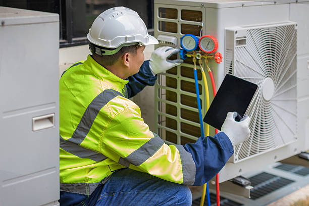 Professional Air Conditioning Repair technician working in Marne, MI